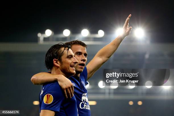 Seamus Coleman of Everton celebrates with teammate Leighton Baines of Everton after scoring his team's second goal during the UEFA Europa League...