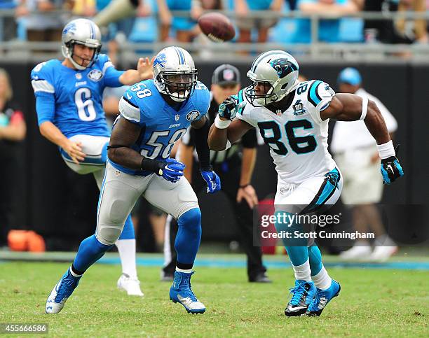Ashlee Palmer of the Detroit Lions covers a punt against Brandon Williams of the Carolina Panthers at Bank of America Stadium on September 14, 2014...