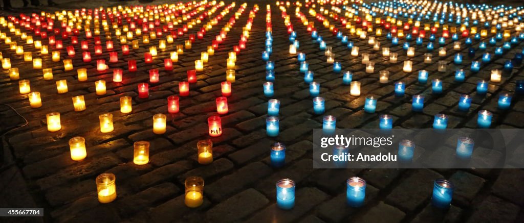 Candles in shape of Catalan's flag and Scottish flag around the St Gilles Cathedral