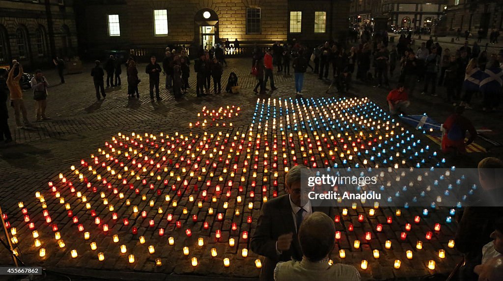 Candles in shape of Catalan's flag and Scottish flag around the St Gilles Cathedral