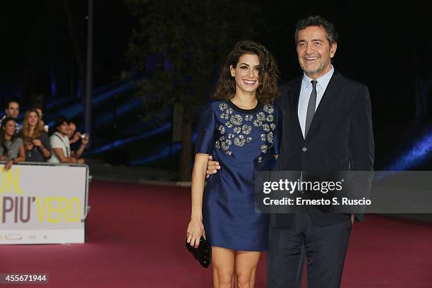 Giulia Michelini and Pietro Valzecchi attend the 'Il Bosco' Pink Carpet as a part of Roma Fiction Fest 2014 at Auditorium Parco Della Musica on...