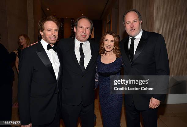 Honoree Jerry Bruckheimer, composter Hans Zimmer, Linda Bruckheimer, and Jon Turteltaub attend the 27th American Cinematheque Award honoring Jerry...