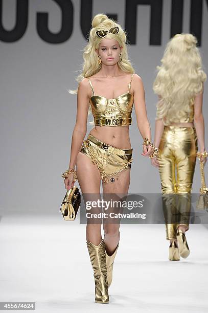 Model walks the runway at the Moschino Spring Summer 2015 fashion show during Milan Fashion Week on September 18, 2014 in Milan, Italy.