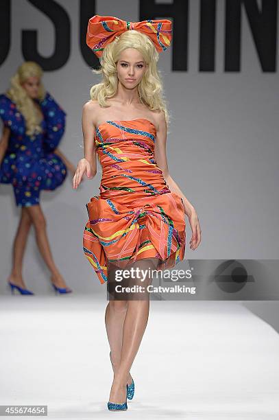 Model walks the runway at the Moschino Spring Summer 2015 fashion show during Milan Fashion Week on September 18, 2014 in Milan, Italy.