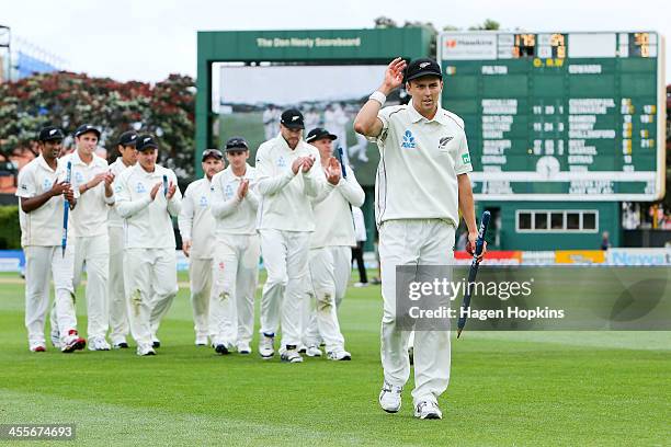 Trent Boult of New Zealand leaves the field at the end of the match after taking ten wickets during day three of the Second Test match between New...