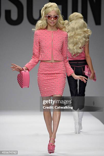 Model walks the runway at the Moschino Spring Summer 2015 fashion show during Milan Fashion Week on September 18, 2014 in Milan, Italy.