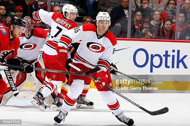 Ron Hainsey of the Carolina Hurricanes skates against the Calgary Flames at Scotiabank Saddledome on December 12, 2013 in Calgary, Alberta, Canada.