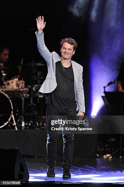 Bruno Nicolini of Benabar performs onstage during 'Leurs Voix Pour L'Espoir 2014' concert at L'Olympia on September 18, 2014 in Paris, France.