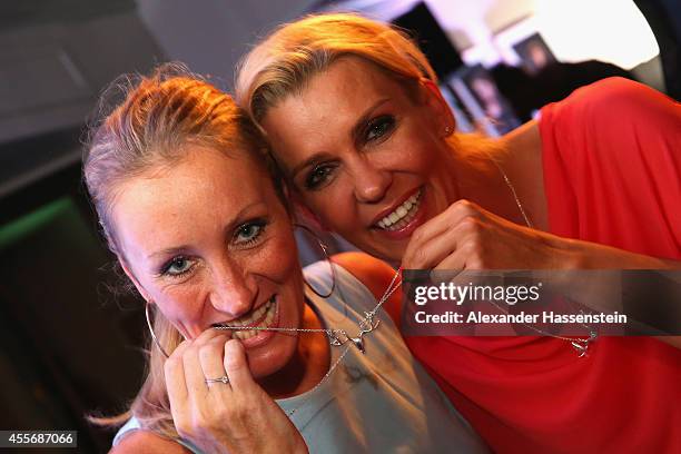 Renata Kochta attends with Alexandra Rietz the Getty Images Hearts You event at Heart on September 18, 2014 in Munich, Germany.