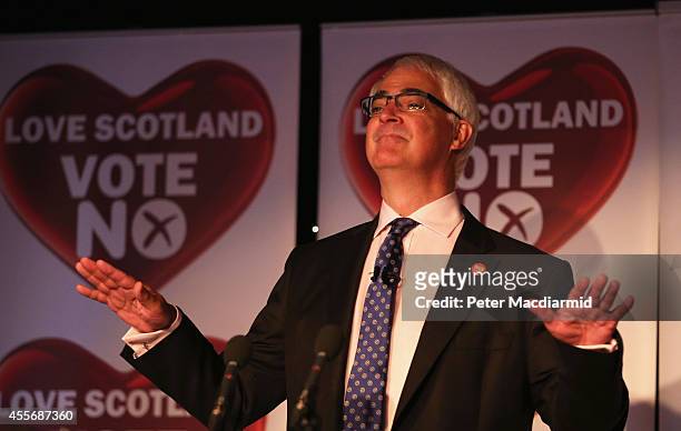 Leader of the Better Together campaign, Alistair Darling, speaks to the press at the campaign Headquarters at the Marriott Hotel on September 19,...