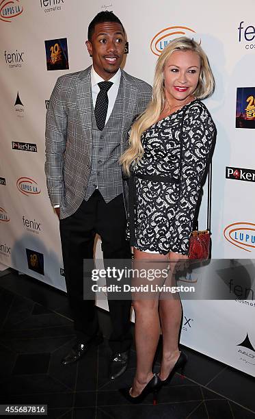 Personality Nick Cannon and Nicole Paxson attend the Stars Get Lucky For Lupus: 6th Annual Poker Tournament at Avalon on September 18, 2014 in...