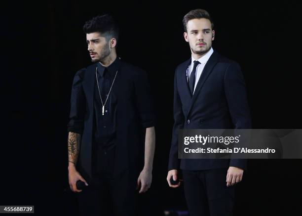 Zayn Malik and Liam Payne of One Direction perform live at 'X Factor'- The Final on December 12, 2013 in Milan, Italy.