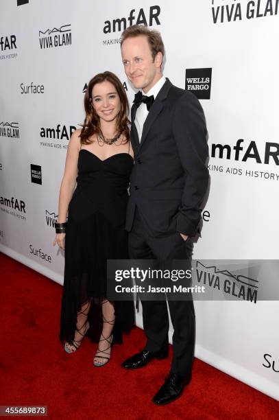 Actors Marguerite Moreau and Christopher Redman attend the 2013 amfAR Inspiration Gala Los Angeles at Milk Studios on December 12, 2013 in Los...