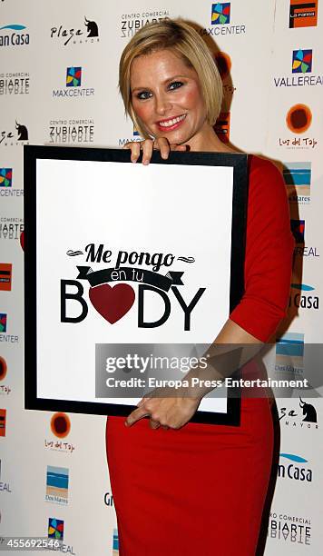 Singer Soraya Arnelas gets charity tatoos during the campaign against cancer 'Me Pongo En Tu Piel' on September 18, 2014 in Madrid, Spain.