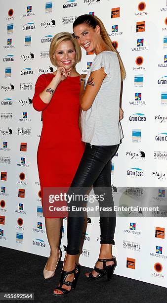 Singer Soraya Arnelas and model Laura Sanchez get charity tatoos during the campaign against cancer 'Me Pongo En Tu Piel' on September 18, 2014 in...