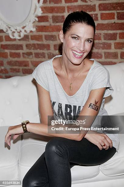 Model Laura Sanchez gets charity tatoos during the campaign against cancer 'Me Pongo En Tu Piel' on September 18, 2014 in Madrid, Spain.