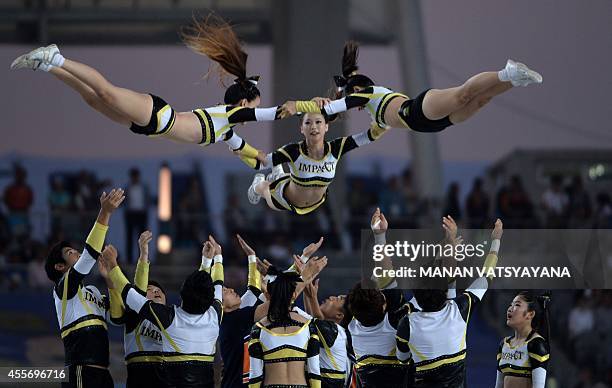 Dancers perform a routine during the opening ceremony of the 2014 Asian Games at the Incheon Asiad Main Stadium in Incheon on September 19, 2014. AFP...