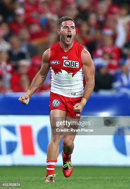 Ben McGlynn of the Swans celebrates a goal during the 1st Preliminary Final AFL match between the Sydney Swans and the North Melbourne Kangaroos at...