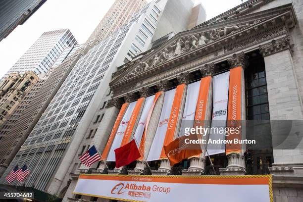 Alibaba Group signage is posted outside the New York Stock Exchange prior to the company's initial price offering on September 19, 2014 in New York...