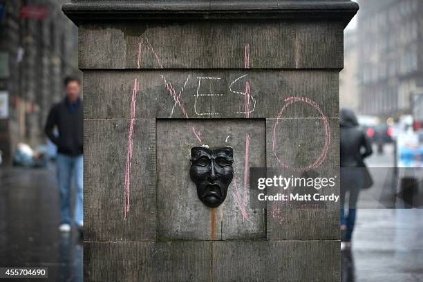 Plinth has Yes and No chalked on the side in central Edinburgh on September 19, 2014 in Edinburgh, Scotland. The majority of Scottish people have...