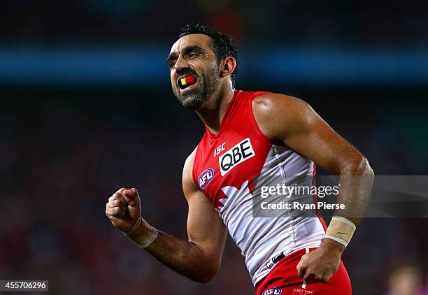 Adam Goodes of the Swans celebrates a goal during the 1st Preliminary Final AFL match between the Sydney Swans and the North Melbourne Kangaroos at...