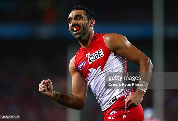 Adam Goodes of the Swans celebrates a goal during the 1st Preliminary Final AFL match between the Sydney Swans and the North Melbourne Kangaroos at...