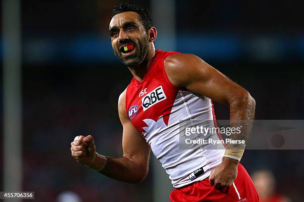 Adam Goodes of the Swans celebrates a goal during the 1st Preliminary Final AFL match between the Sydney Swans and the North Melbourne Kangaroos at...