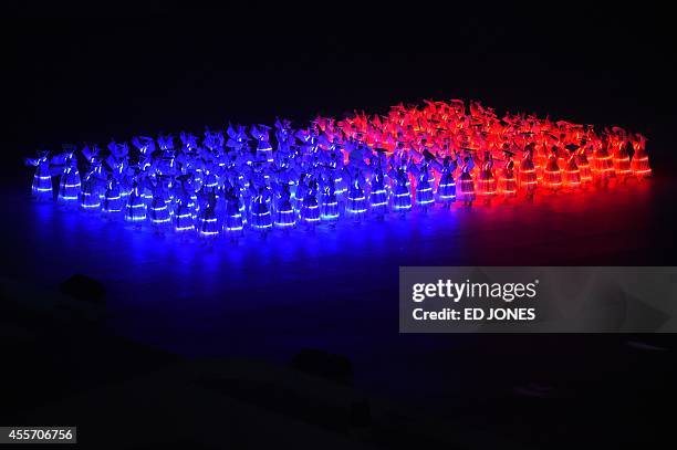 Dancers perform during the opening ceremony of the 2014 Asian Games at the Incheon Asiad Main Stadium in Incheon on September 19, 2014. AFP PHOTO /...