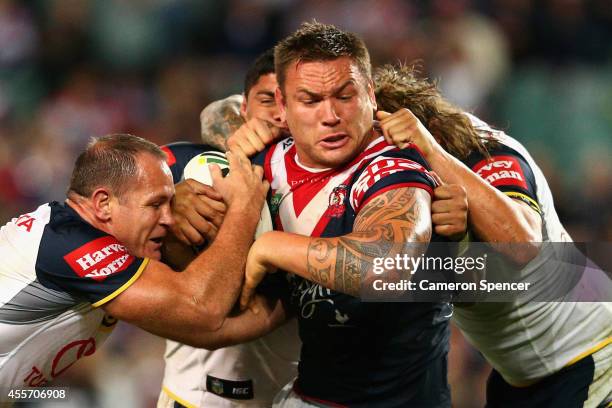 Jared Waerea-Hargreaves of the Roosters is tackled during the 1st NRL Semi Final match between the Sydney Roosters and the North Queensland Cowboys...