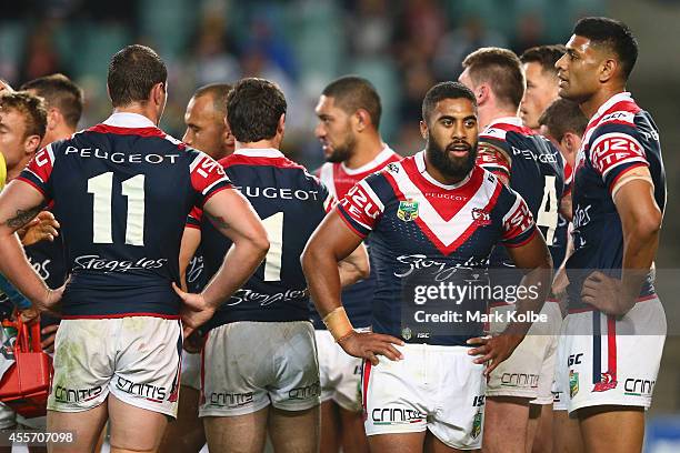 Michael Jennings of the Roosters looks dejected after a Cowboys try during the 1st NRL Semi Final match between the Sydney Roosters and the North...