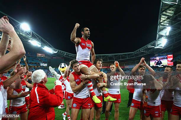 Adam Goodes of the Swans is chaired off after his 350th AFL match during the 1st Preliminary Final AFL match between the Sydney Swans and the North...