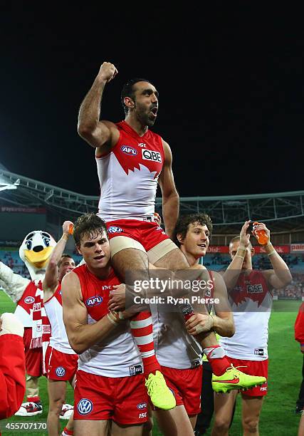 Adam Goodes of the Swans is chaired off after his 350th AFL match during the 1st Preliminary Final AFL match between the Sydney Swans and the North...