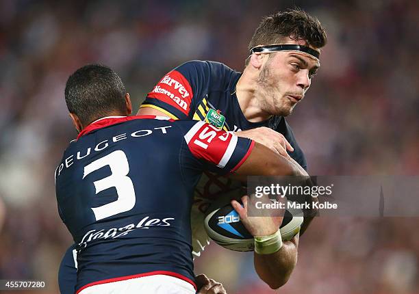 Ethan Lowe of the Cowboys is tackled during the 1st NRL Semi Final match between the Sydney Roosters and the North Queensland Cowboys at Allianz...