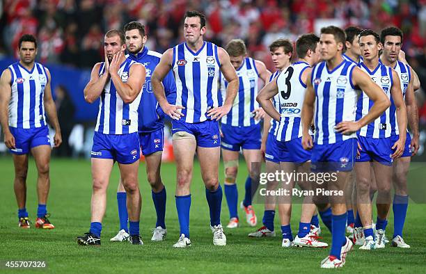 The Kangaroos look dejected after the 1st Preliminary Final AFL match between the Sydney Swans and the North Melbourne Kangaroos at ANZ Stadium on...