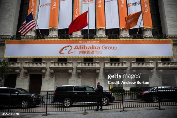 Alibaba Group signage is posted outside the New York Stock Exchange prior to the company's initial price offering on September 19, 2014 in New York...