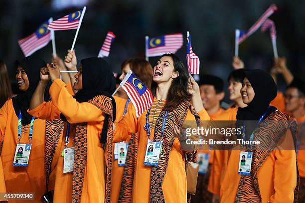 Athletes from Malaysia arrive during the Opening Ceremony ahead of the 2014 Asian Games at Incheon Asiad Main Stadium on September 19, 2014 in...