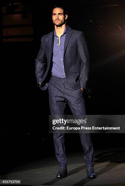 Model showcases designs by Roberto Verino on the runway during Mercedes Benz Fashion Week Madrid Spring/Summer 2015 at Ifema on September 12, 2014 in...