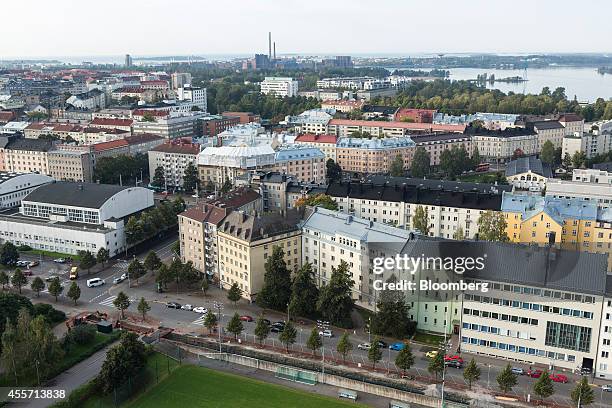 Residential and commercial properties stand on the city skyline in Helsinki, Finland, on Friday, Sept. 19, 2014. Finland can't afford to be stripped...