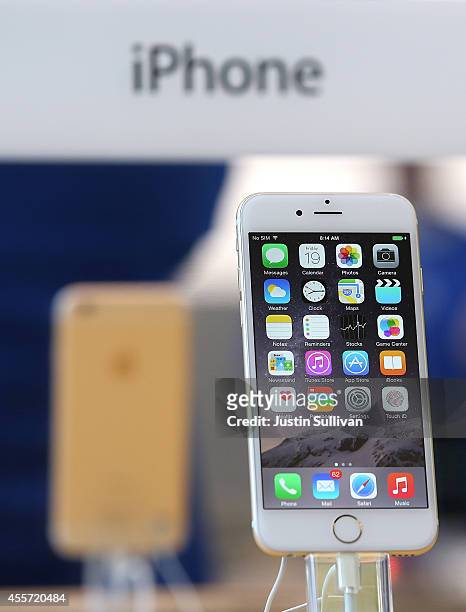 The new iPhone 6 is displayed at an Apple Store on September 19, 2014 in Palo Alto, California. Hundreds of people lined up to purchase the new...