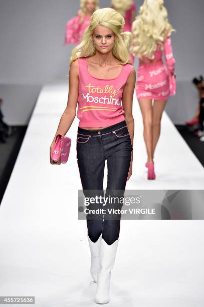 Model walks the runway during the Moschino Ready to Wear show as part of Milan Fashion Week Womenswear Spring/Summer 2015 on September 18, 2014 in...