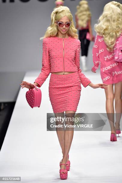 Model walks the runway during the Moschino Ready to Wear show as part of Milan Fashion Week Womenswear Spring/Summer 2015 on September 18, 2014 in...