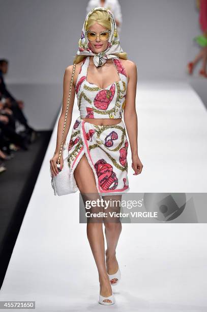 Model walks the runway during the Moschino Ready to Wear show as part of Milan Fashion Week Womenswear Spring/Summer 2015 on September 18, 2014 in...