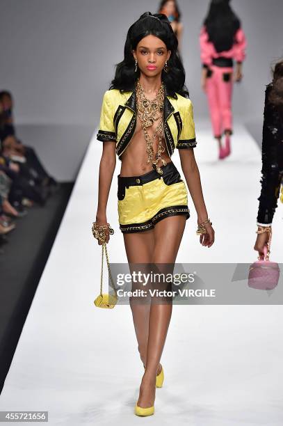 Model walks the runway during the Moschino Ready to Wear show as part of Milan Fashion Week Womenswear Spring/Summer 2015 on September 18, 2014 in...