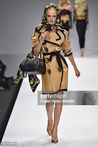 Model walks the runway during the Moschino Ready to Wear show as part of Milan Fashion Week Womenswear Spring/Summer 2015 on September 18, 2014 in...
