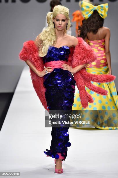 Model walks the runway during the Moschino Ready to Wear show as part of Milan Fashion Week Womenswear Spring/Summer 2015 on September 18, 2014 in...