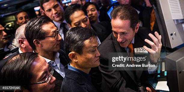 Glenn Carell , a trader with Barclays, explains the workings of deciding an initial price offering to Jack Ma, founder and executive chairman of...