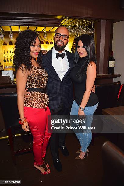 Monyetta Shaw, Kenny Burns and Amy Eslami attend BMI dinner honoring Future at 10 degrees South Restaurant on September 18, 2014 in Atlanta, Georgia.