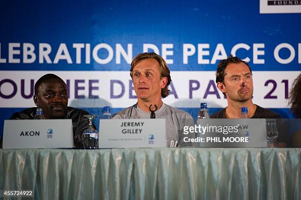 Senegalese Hip-hop star Akon , Peace One Day founder Jeremy Gilley , and British actor Jude Law take part in a press conference as part of the "Peace...