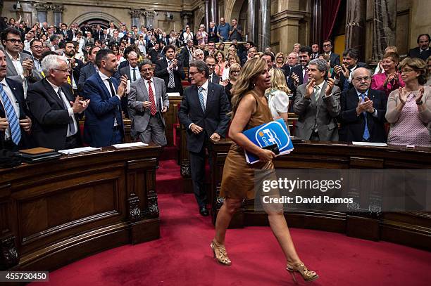 The leader of the anti-separatist right wing political party Partido Popular of Catalonia Alicia Sanchez-Camacho leaves the chamber after the Catalan...