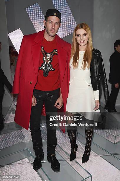 Johnny Wujek and Bella Thorne attend the Versace show during the Milan Fashion Week Womenswear Spring/Summer 2015 on September 19, 2014 in Milan,...